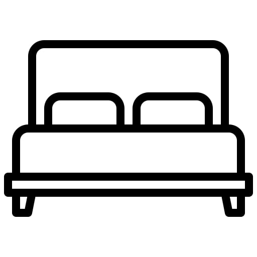 Bett auf grauem Grund mit braunen Kissen und an den seiten 2 Nachttische.